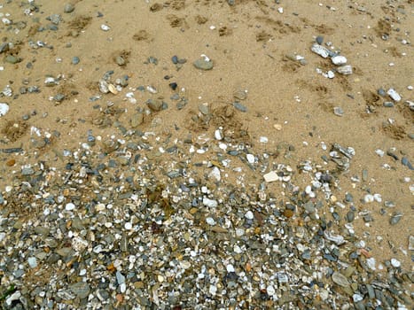 Sand and pebbles on a winter beach