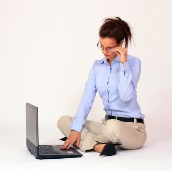 portrait of young woman with lap top computer