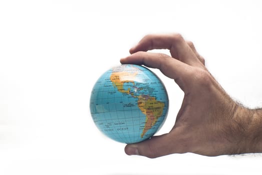 Globe ,earth in human hand, isolated on white