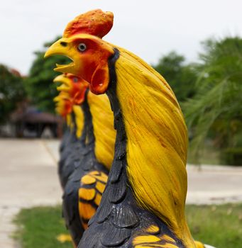 Fighting Cock Statue statue of Thailand to the altar in the temple.