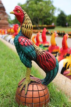 Fighting Cock Statue statue of Thailand to the altar in the temple