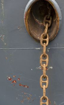huge rusty anchor chain links on a vessel