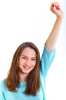 Portrait of happy teenage girl in a blue dress. Isolated over white background.