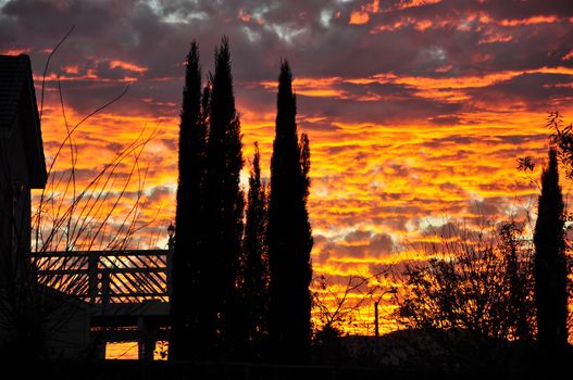 View of a brilliant and colorful sunset in the town of San Jacinto, California.