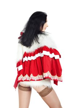 Beautiful brunette lady in the warm furry Santa Claus costume on a white background