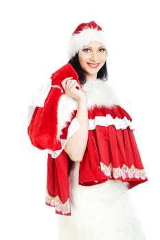 Smiling woman in Santa Claus costume holding red bag with gifts on a white background