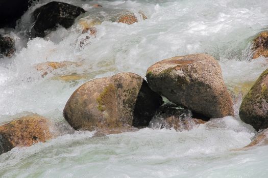 Image of water stream in mountain terrain