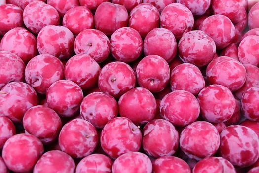 Image of the background fresh red plum