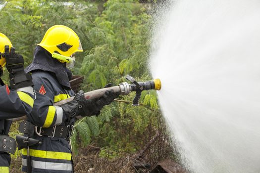 Firefighter fighting fire