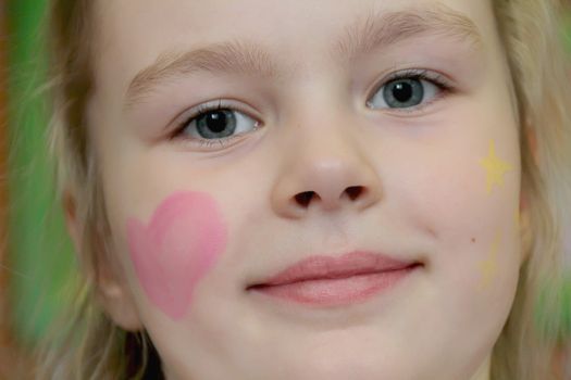 Portrait of beautiful girl with blue eyes