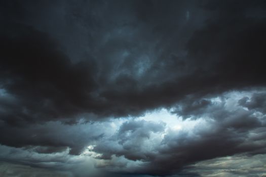 Stormy clouds gray low key sky with dramatic shadows and lights