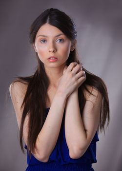 Glamour portrait of beautiful woman model with fresh daily makeup and romantic hairstyle.