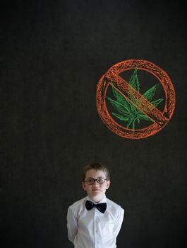 Thinking boy dressed up as business man with no weed marijuana on blackboard background