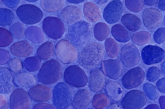 The decorative stone wall ,  blue background texture