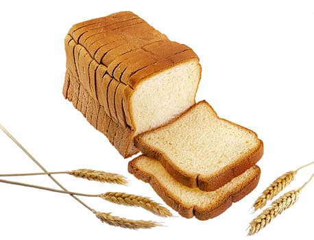 Sliced bread with wheat spikes - isolated