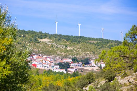 Cuenca San Martin de Boniches village with windmills in early autumn Spain