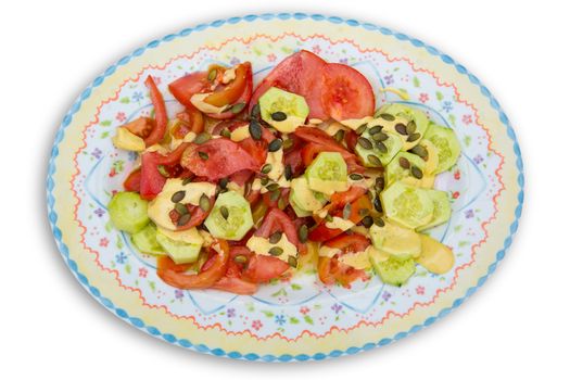 Mediterranean salad with tomato cucumber pumpkin seeds and sauce