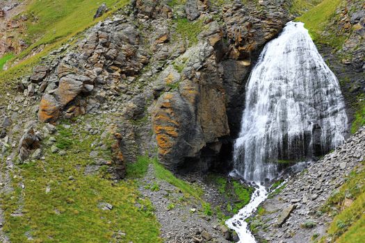 Waterfall Girlish Braids between the mountains of Northern Caucas