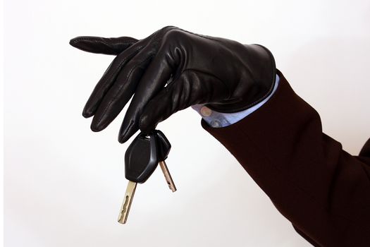 close up of female hand holding a car keys