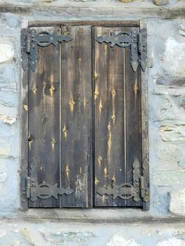 Rustic old wood window in Greece