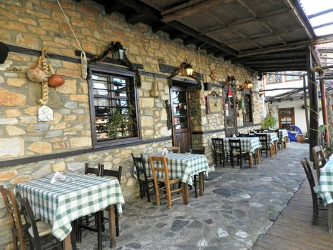 Outdoor tavern in Paleo Pantelimonas, Greece