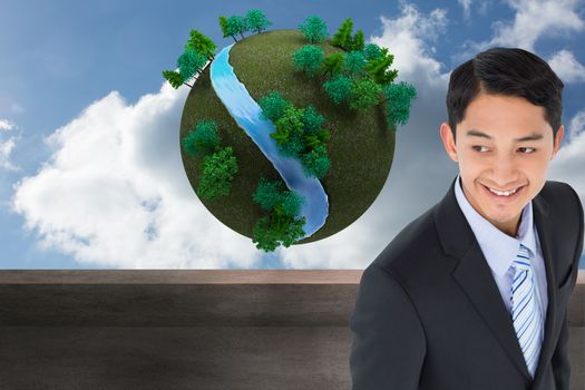 Composite image of smiling asian businessman 