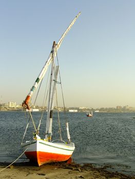 Felucca boat on the Nile river bank, Aswan, Egypt
