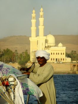 Captain getting his felucca boat ready, Aswan, Egypt