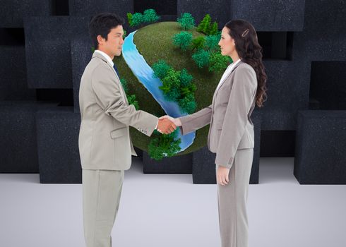 Composite image of side view of hand shaking trading partners