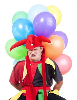 jester - entertaining figure in typical costume with colorful balloons