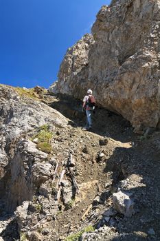 hiking on mountain ridge in San Pellegrino valley, Trentino, Italy