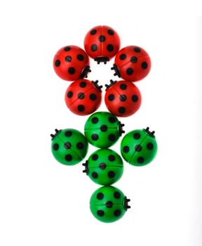 Flower from ladybugs, isolated on white background