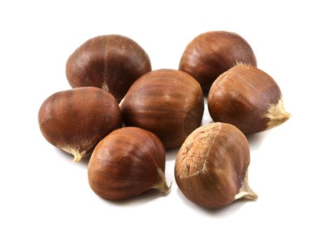 Several chestnuts isolated on white background