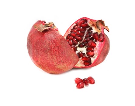 Halved pomegranate isolated on white background
