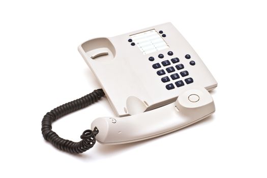 Grey plastic telephone on white background