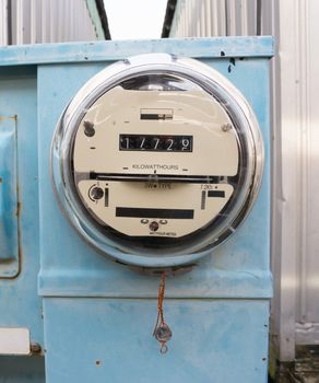 Utility electric meters outside old analog style
