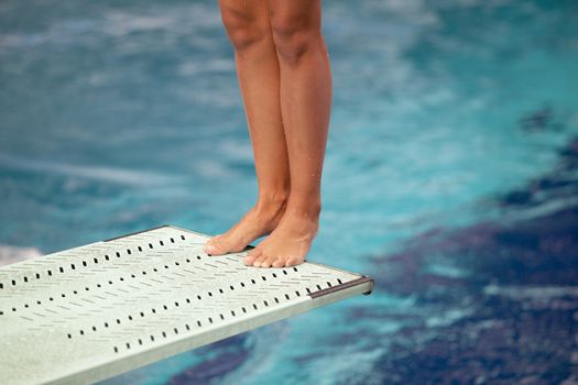 High diver jumping into the water