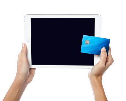 Human hands holding cash card and tablet pc