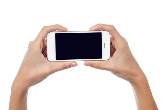 Woman hand holding new cellphone