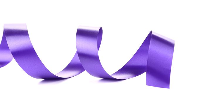 Violet curly silk ribbon. Isolated on a white background.