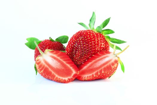 Strawberries with leaves. Isolated on a white background