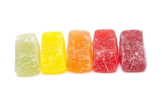 Different fruit jellies on white background