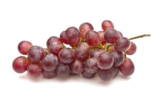 Bunch of red grapes on white background