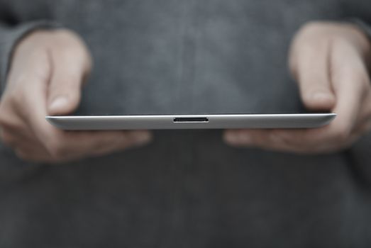 Human hands with tablet PC. Close-up view