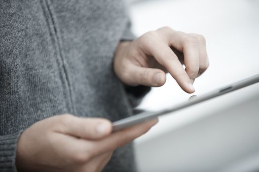 Human hands with tablet PC. Close-up view