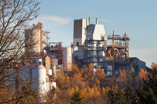 Lime works processing plant installation in rural Germany near W��lfrath in late fall forest
