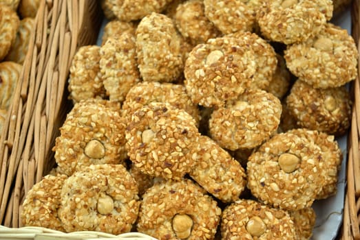 Delicious bakes nuts cookies served in a rattan tray