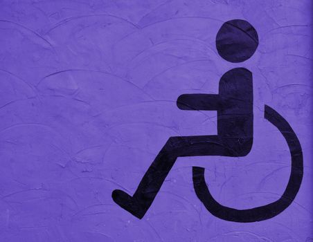 the symbol handicapped on purple wall background