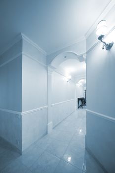 long and beautiful corridor in a modern apartment