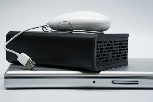 laptop, mouse and an external hard drive